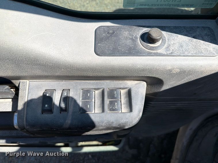 image for item EW0011 2015 Ford F350 Super Duty Crew Cab flatbed pickup truck