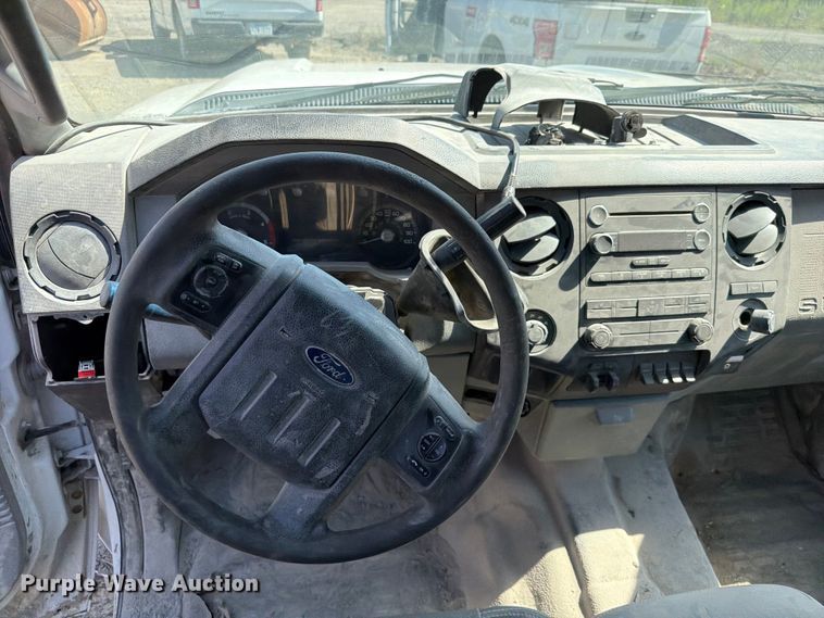 image for item EW0011 2015 Ford F350 Super Duty Crew Cab flatbed pickup truck