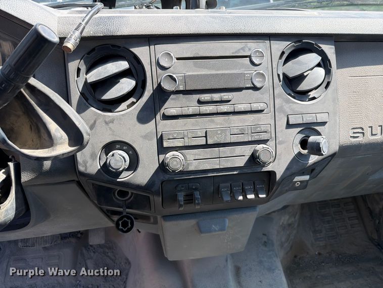 image for item EW0011 2015 Ford F350 Super Duty Crew Cab flatbed pickup truck