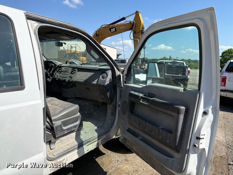 image for item EW0011 2015 Ford F350 Super Duty Crew Cab flatbed pickup truck