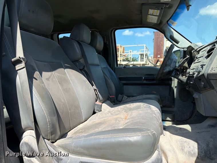 image for item EW0011 2015 Ford F350 Super Duty Crew Cab flatbed pickup truck