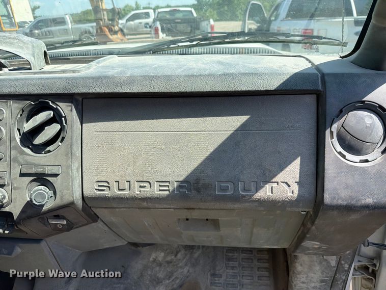 image for item EW0011 2015 Ford F350 Super Duty Crew Cab flatbed pickup truck