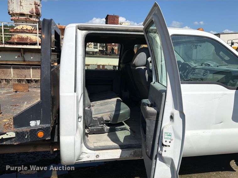 image for item EW0011 2015 Ford F350 Super Duty Crew Cab flatbed pickup truck