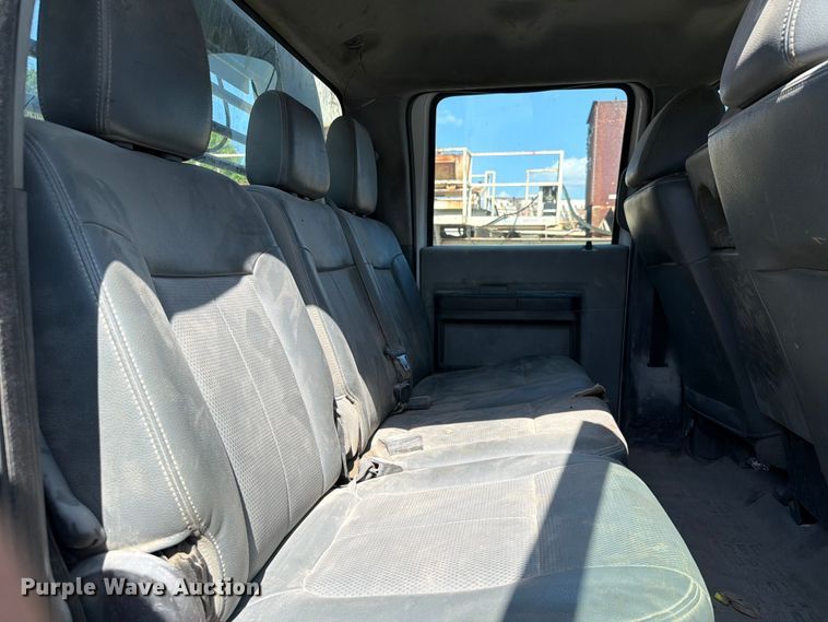 image for item EW0011 2015 Ford F350 Super Duty Crew Cab flatbed pickup truck
