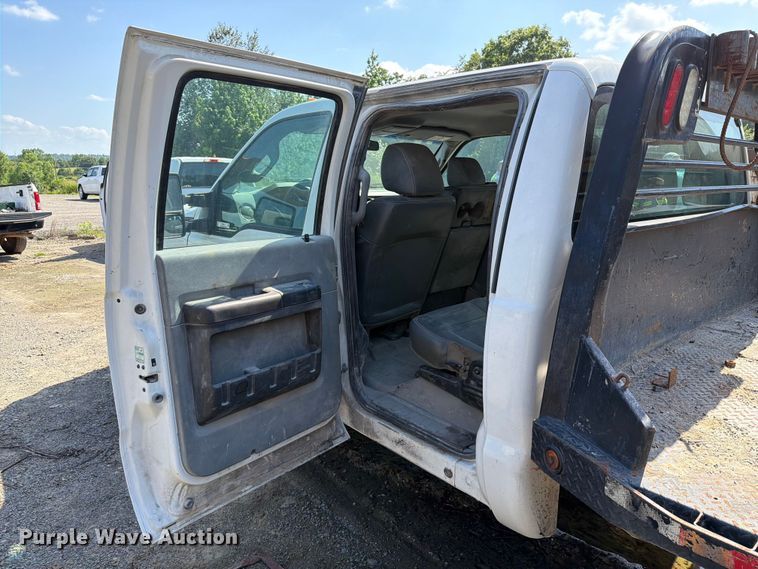 image for item EW0011 2015 Ford F350 Super Duty Crew Cab flatbed pickup truck