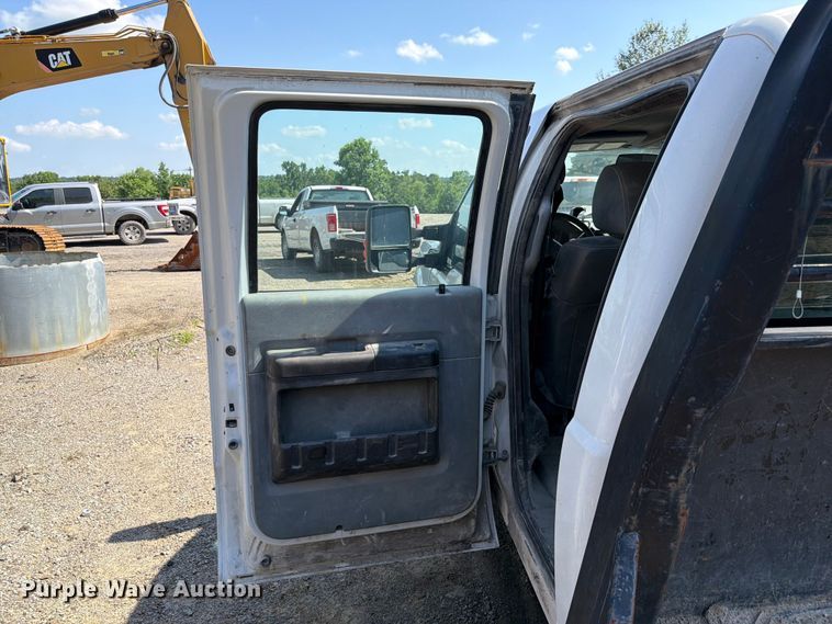 image for item EW0011 2015 Ford F350 Super Duty Crew Cab flatbed pickup truck