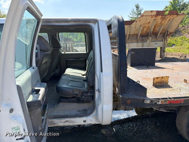 image for item EW0011 2015 Ford F350 Super Duty Crew Cab flatbed pickup truck