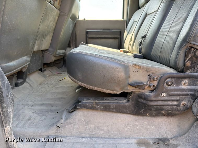 image for item EW0011 2015 Ford F350 Super Duty Crew Cab flatbed pickup truck