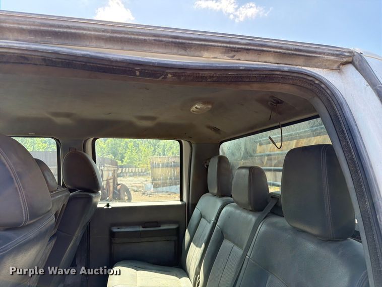 image for item EW0011 2015 Ford F350 Super Duty Crew Cab flatbed pickup truck