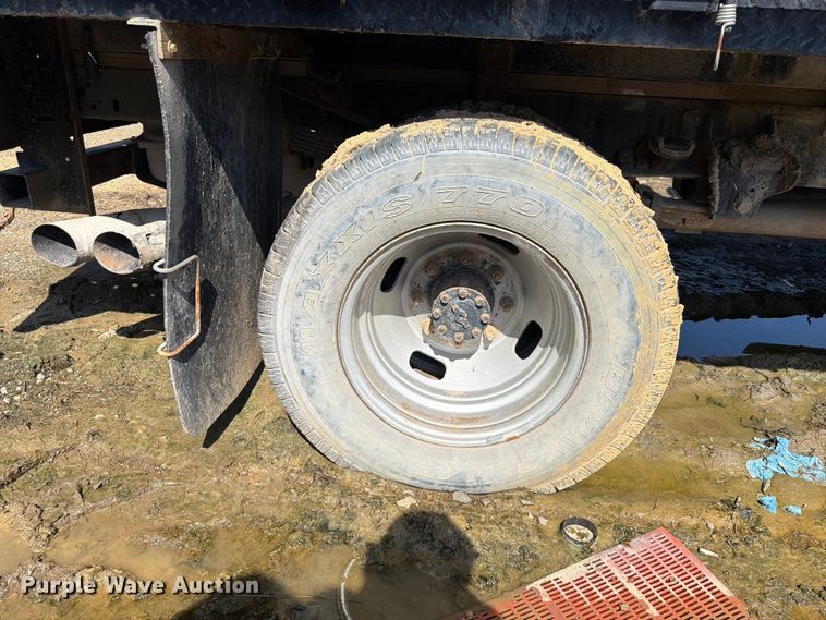 image for item EW0011 2015 Ford F350 Super Duty Crew Cab flatbed pickup truck