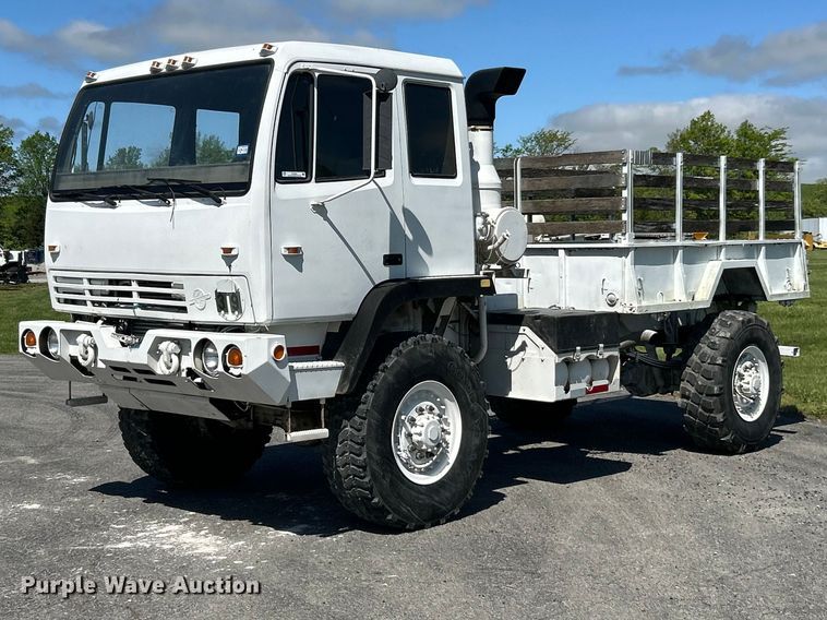image for item FC2521 1997 Stewart & Stevenson M1078 flatbed truck