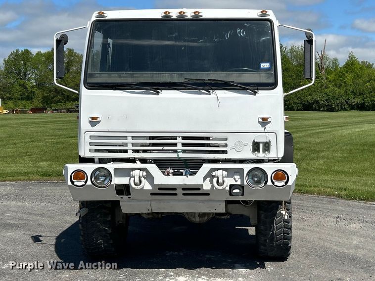 image for item FC2521 1997 Stewart & Stevenson M1078 flatbed truck