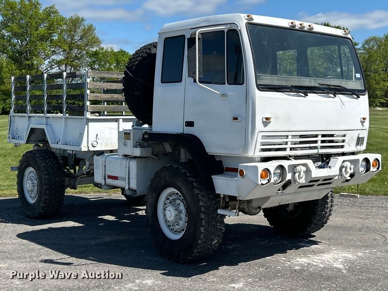 image for item FC2521 1997 Stewart & Stevenson M1078 flatbed truck