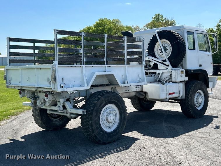 image for item FC2521 1997 Stewart & Stevenson M1078 flatbed truck