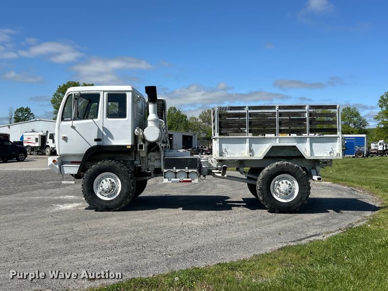 image for item FC2521 1997 Stewart & Stevenson M1078 flatbed truck