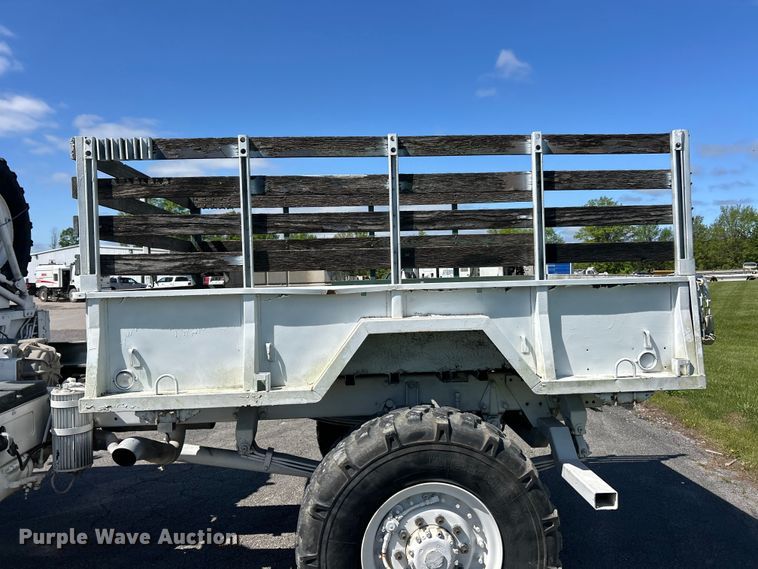 image for item FC2521 1997 Stewart & Stevenson M1078 flatbed truck