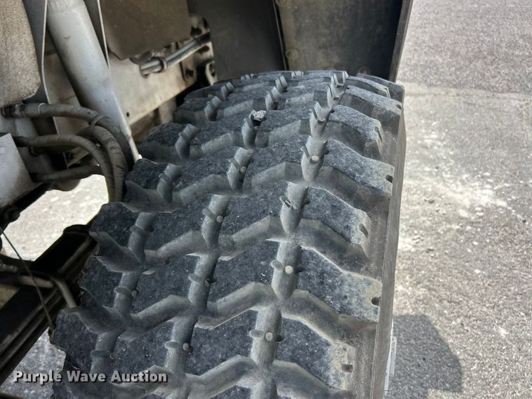 image for item FC2521 1997 Stewart & Stevenson M1078 flatbed truck
