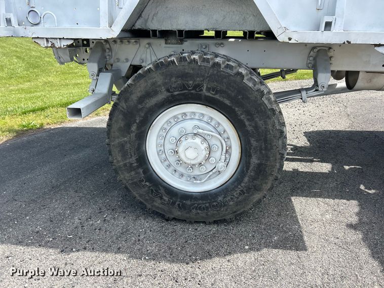image for item FC2521 1997 Stewart & Stevenson M1078 flatbed truck