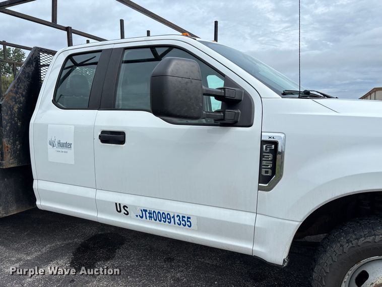 image for item FC5924 2017 Ford F350 Super Duty XL Ext. Cab flatbed pickup truck
