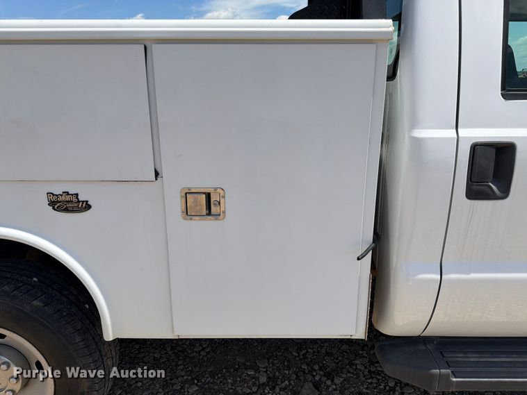image for item FK3042 2009 Ford F250 Super Duty Crew Cab utility bed pickup truck