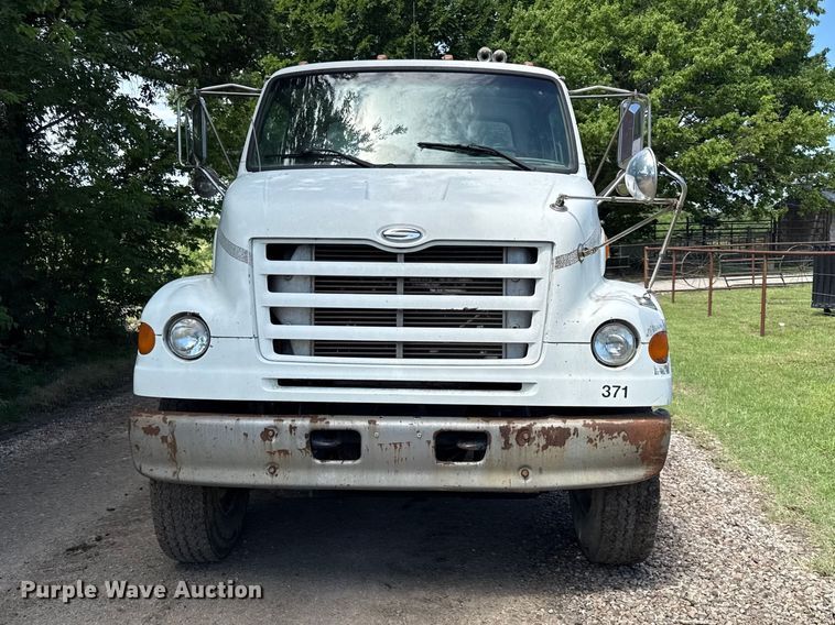 image for item EN0425 2000 Sterling LT7501 grapple truck