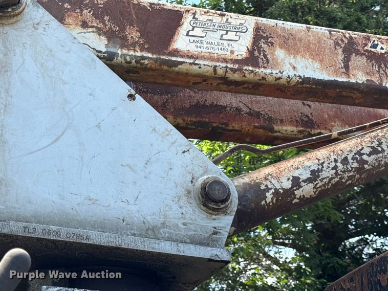 image for item EN0425 2000 Sterling LT7501 grapple truck