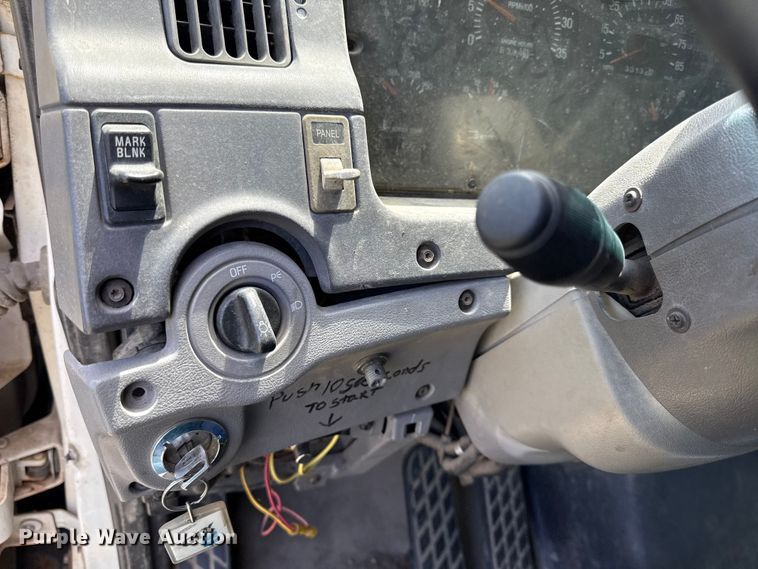image for item EN0425 2000 Sterling LT7501 grapple truck