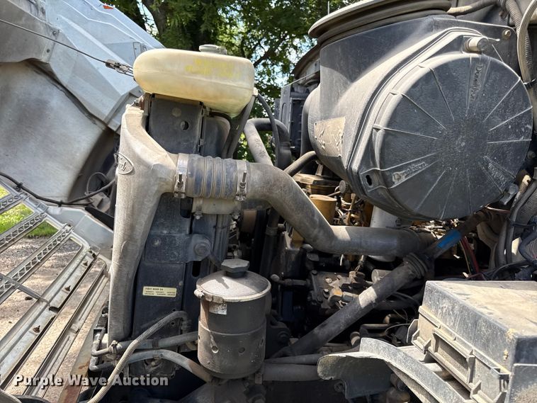 image for item EN0425 2000 Sterling LT7501 grapple truck