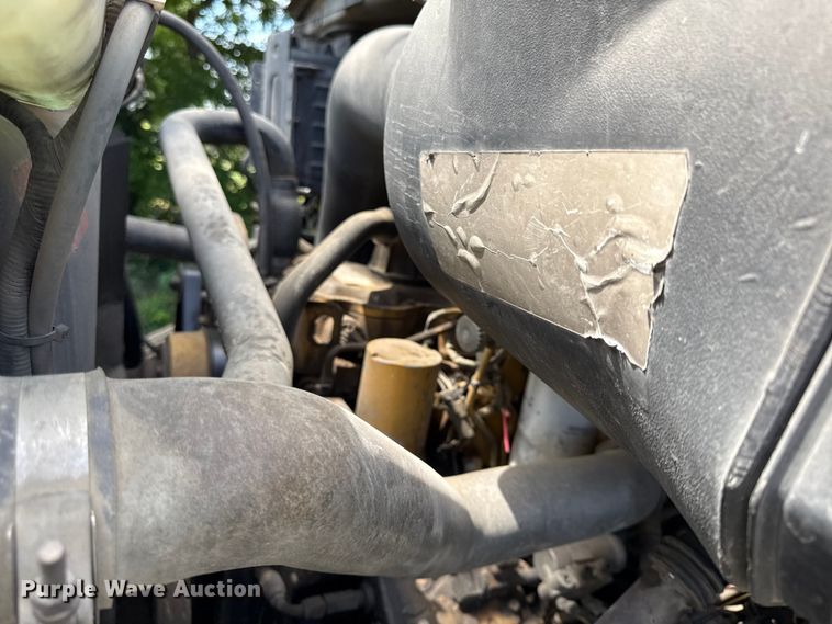 image for item EN0425 2000 Sterling LT7501 grapple truck