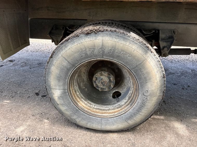 image for item EN0425 2000 Sterling LT7501 grapple truck