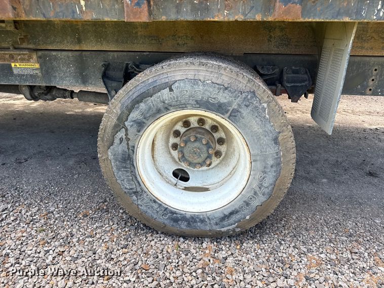 image for item EN0425 2000 Sterling LT7501 grapple truck