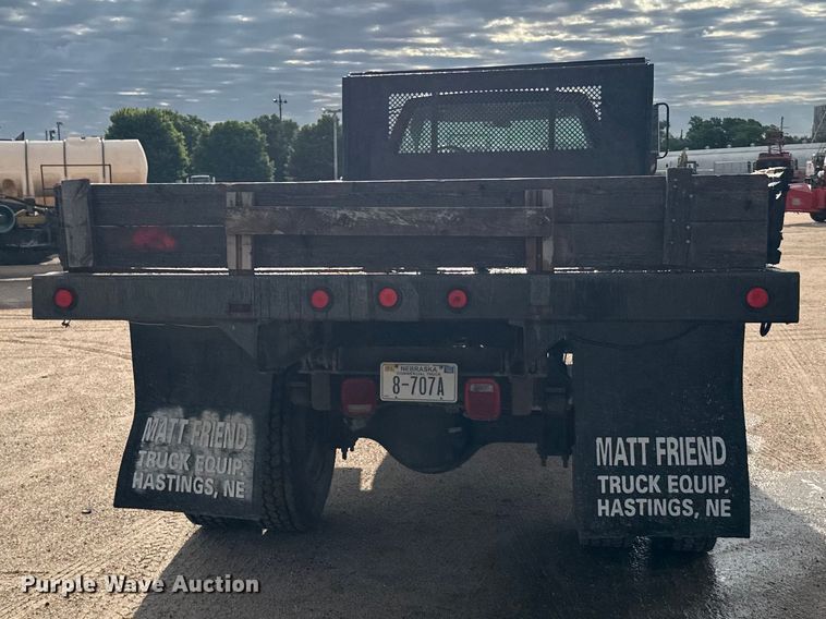 image for item EW4873 1999 GMC 6500 dump flatbed truck