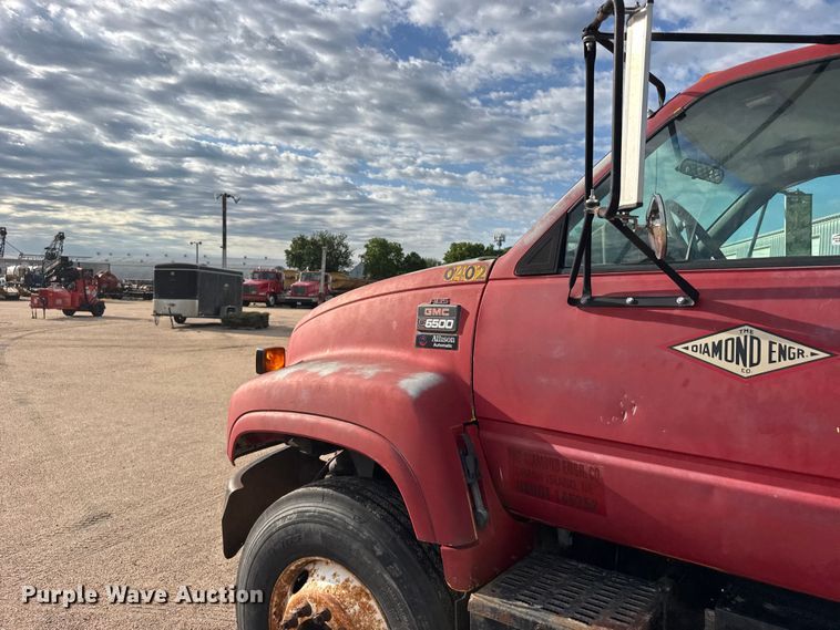 image for item EW4873 1999 GMC 6500 dump flatbed truck