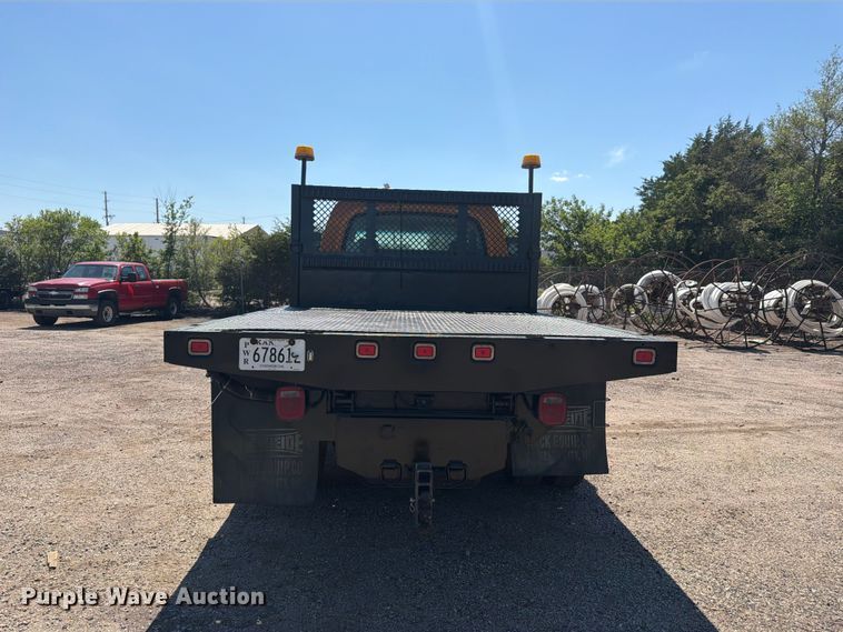 image for item NJ9043 2007 Chevrolet C4500 Crew Cab dump flatbed truck