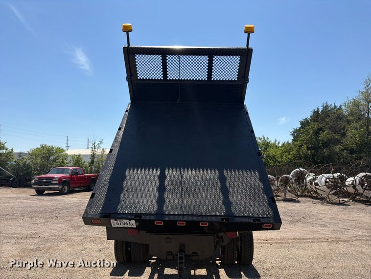 image for item NJ9043 2007 Chevrolet C4500 Crew Cab dump flatbed truck