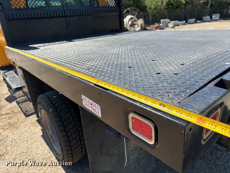 image for item NJ9043 2007 Chevrolet C4500 Crew Cab dump flatbed truck