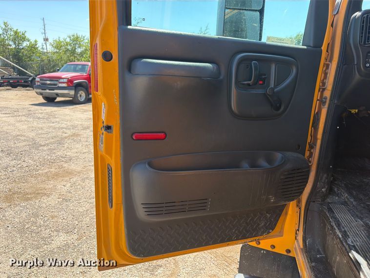 image for item NJ9043 2007 Chevrolet C4500 Crew Cab dump flatbed truck