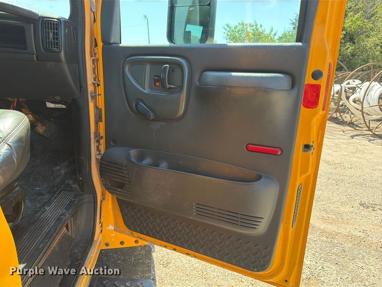image for item NJ9043 2007 Chevrolet C4500 Crew Cab dump flatbed truck
