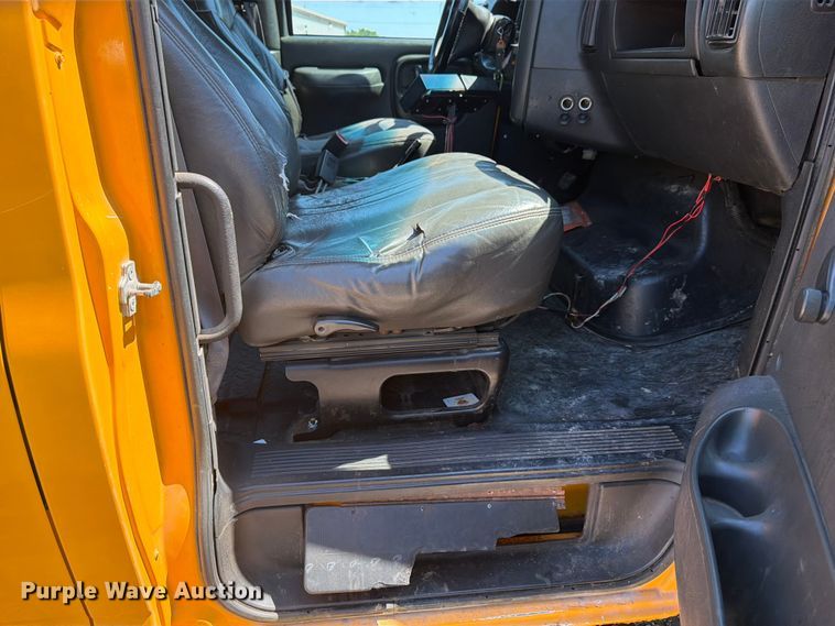 image for item NJ9043 2007 Chevrolet C4500 Crew Cab dump flatbed truck