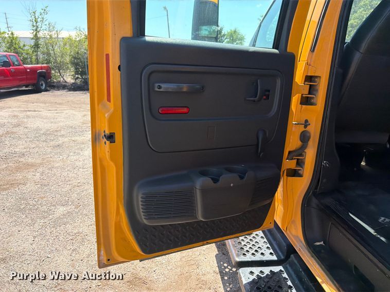 image for item NJ9043 2007 Chevrolet C4500 Crew Cab dump flatbed truck