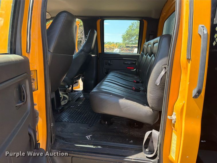 image for item NJ9043 2007 Chevrolet C4500 Crew Cab dump flatbed truck