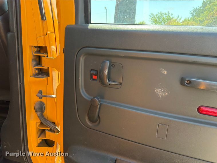 image for item NJ9043 2007 Chevrolet C4500 Crew Cab dump flatbed truck