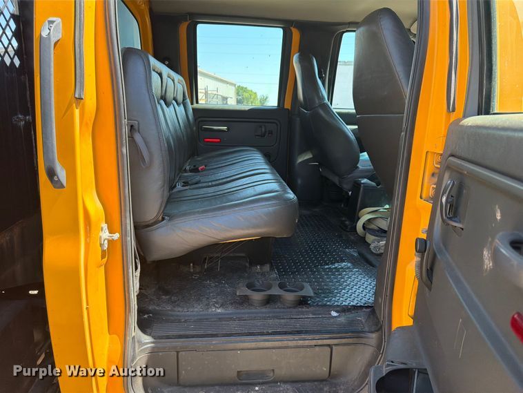 image for item NJ9043 2007 Chevrolet C4500 Crew Cab dump flatbed truck