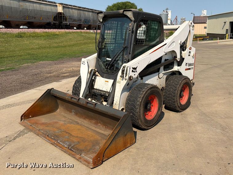 image for item ER1806 2014 Bobcat S750 skid steer loader