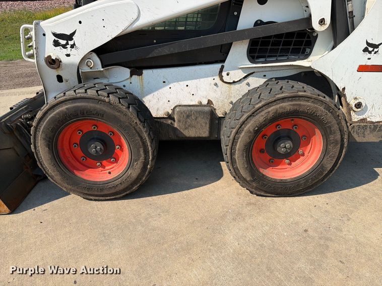 image for item ER1806 2014 Bobcat S750 skid steer loader