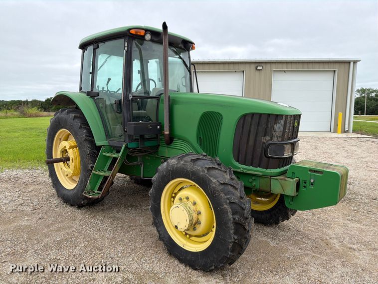 image for item EX2492 2003 John Deere 6615 MFWD tractor