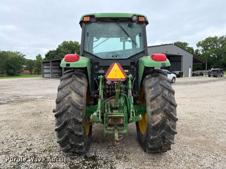 image for item EX2492 2003 John Deere 6615 MFWD tractor