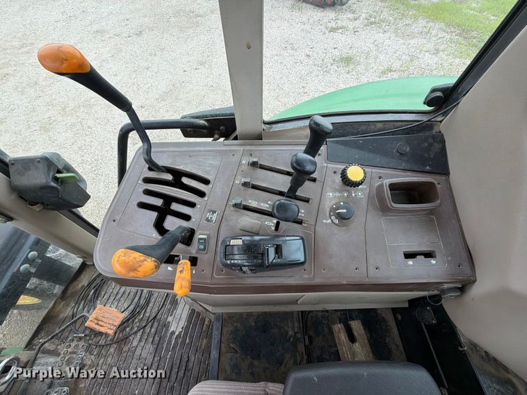 image for item EX2492 2003 John Deere 6615 MFWD tractor