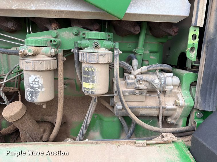image for item EX2492 2003 John Deere 6615 MFWD tractor