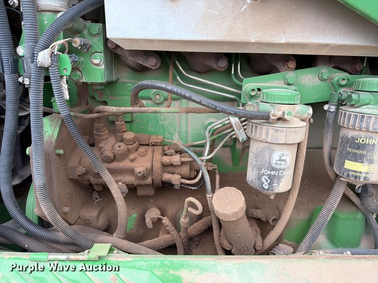 image for item EX2492 2003 John Deere 6615 MFWD tractor
